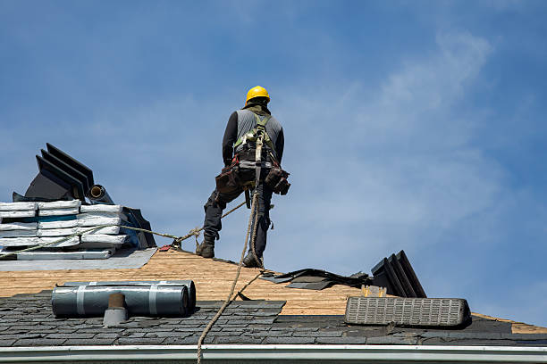 Professional Storm Damage Roof Repair technician working in Conroe, TX